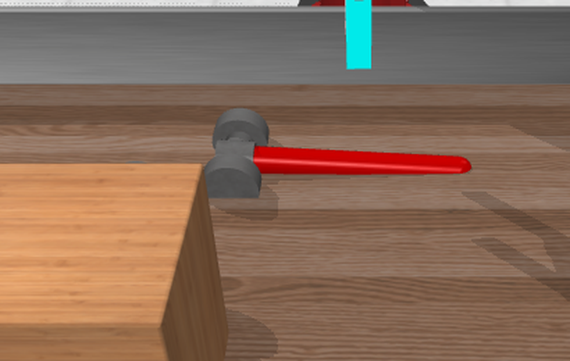 The Meta-World hammer scene from the perception camera, with the red-handled hammer on the table beside the box